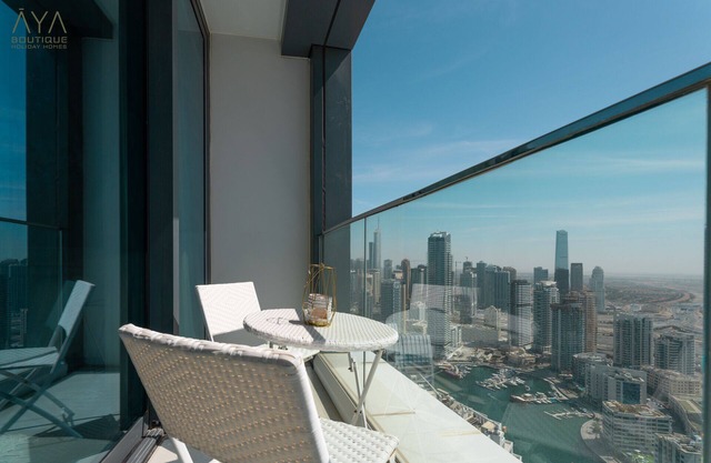 Aya - Canal View From this 1BR in Jumeirah Gate Tower 1