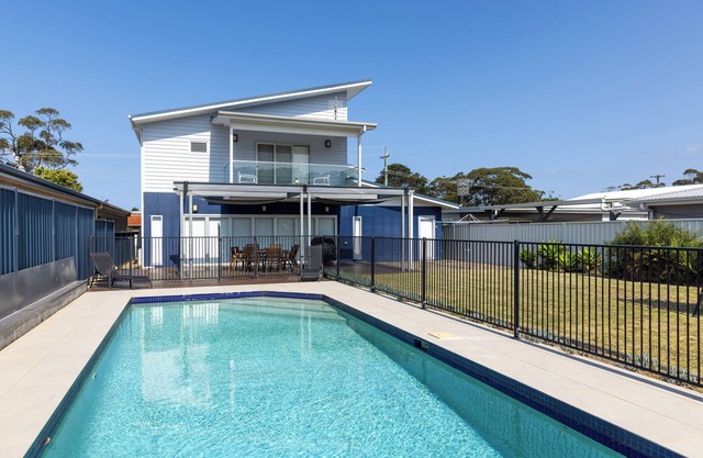 BEACH KING family home with a wonderful pool and play equipment close to beach