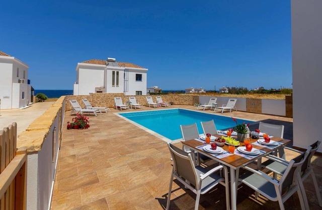 Beachfront 4 bed villa with sea views.