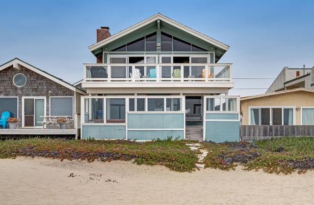 Beachfront home with amazing ocean views, a two-level deck, and bikes