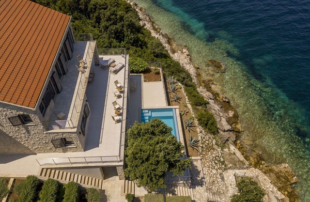 Beachfront Villa Poseidon with Heated Pool