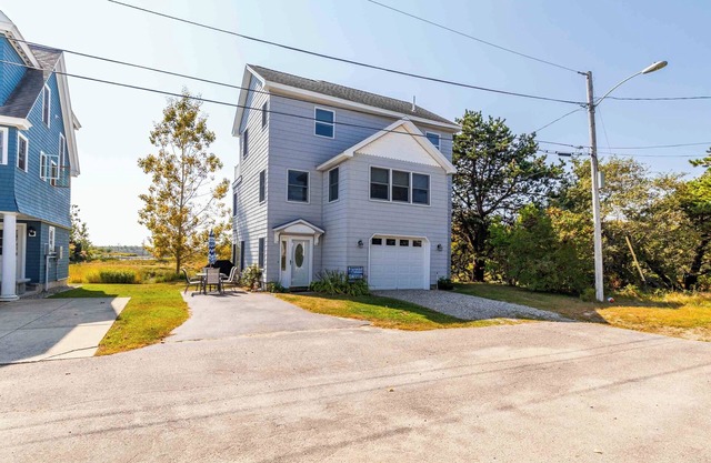 Beautifu,l Coastal Home on three floors with ocean and marsh views!