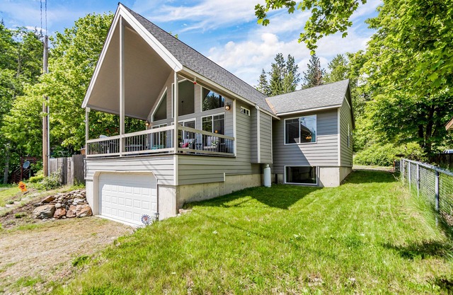 Beautiful 3-story home with lake/bay views, deck, grill, firepit & fireplace