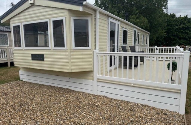 Beautiful 8 berth caravan with decking at Caldecott Park, Norfolk ref 91046C