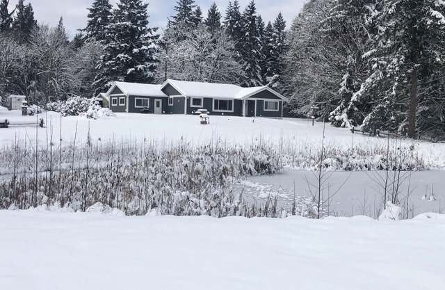 Beautiful and private 3 bed 2 bathroom Rancher on 3 acres with a pond view.