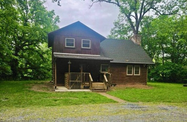 Beautiful cabin situated on wooded banks of the Shenandoah River.