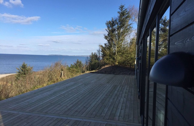Beautiful holiday home located at the 1st row by the fjord.