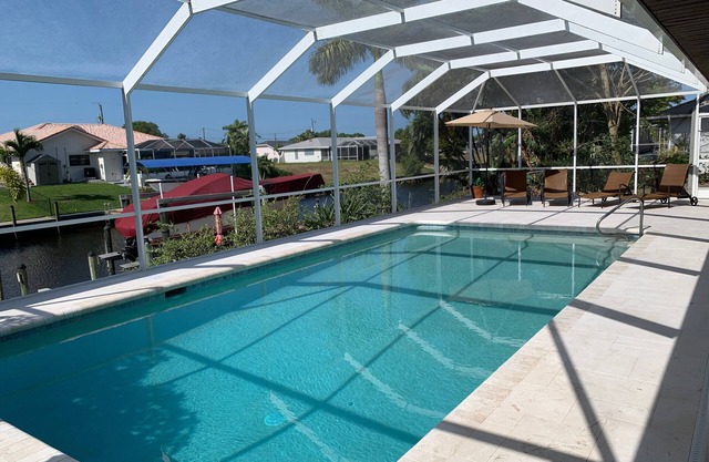 Beautiful south-facing pool villa on the saltwater canal in Cape Coral