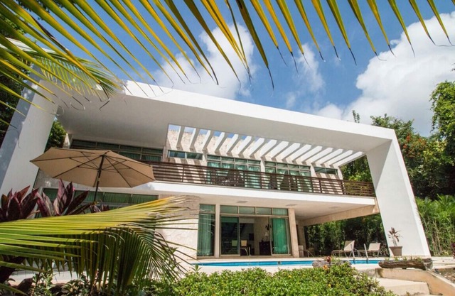 Beautiful Villa surrounded by lush jungle facing golf course within Resort