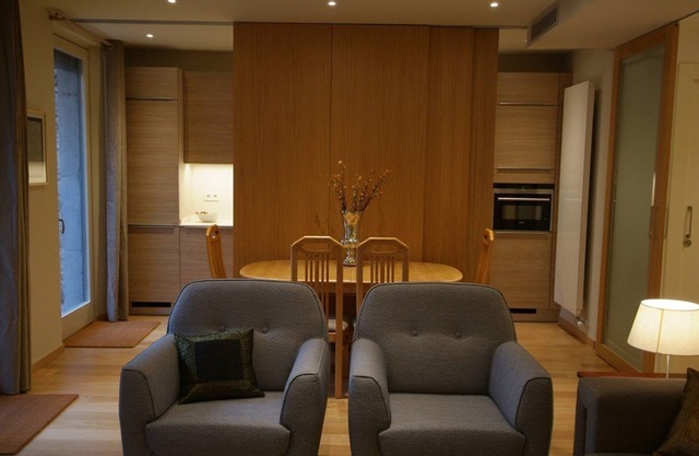 Beautifully furnished luxury one bedroom apartment with a small garden and pool