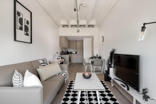Black and White 1 BR Business stays Above MK Train Station