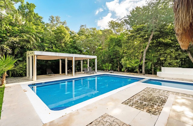 Boho-Chic Villa with 4 Bedrooms & 5 Bathrooms in Exclusive Playacar Phase 2