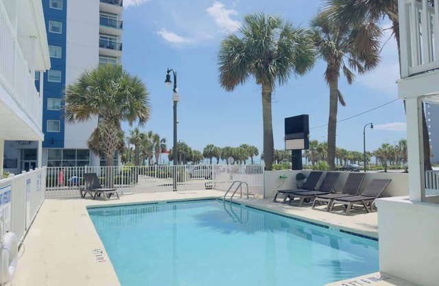 Boutique on the beach, Studio #117 + Pool