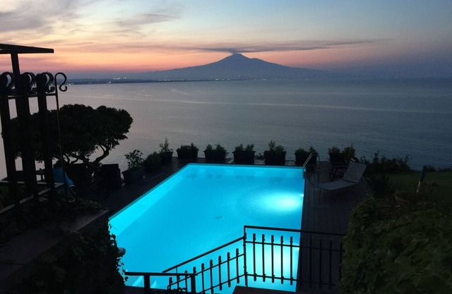 Breathtakin view of the sea and Etna volcano and private beach& swimming pool