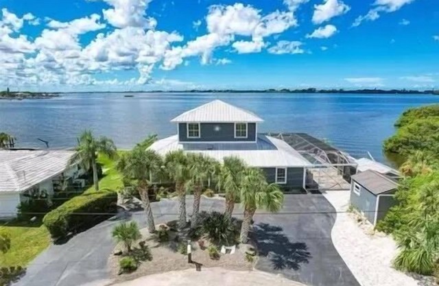 Breathtaking 250' Bayfront home w/private pool