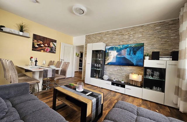 Bright and modern apartment on the ground floor in the center