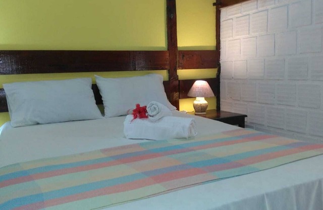 Cabin with kitchen: 500 meters from the beach. With parking and barbecue.