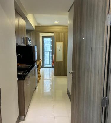 Cairong Inn Condominium pool TV with Netflix FAME RESIDENCES