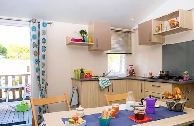 Camping Le Bois de Pleuven**** - Classic 3-room mobile home 5 adults + 1 child under 12