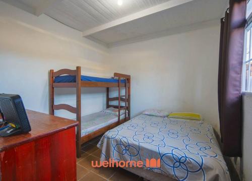 Casa em Bertioga com lazer e praia próxima