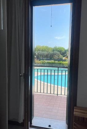Casa Origine, appartamento vista piscina, al mare