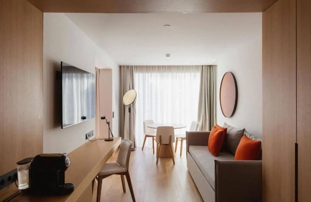 Central Retreat with Rooftop Swims and an Exclusive Light Display