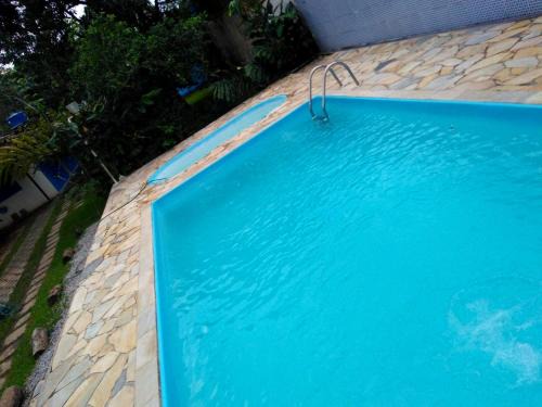 Chácara a 450mt da Praia Boracéia piscina infantil e outra adulto