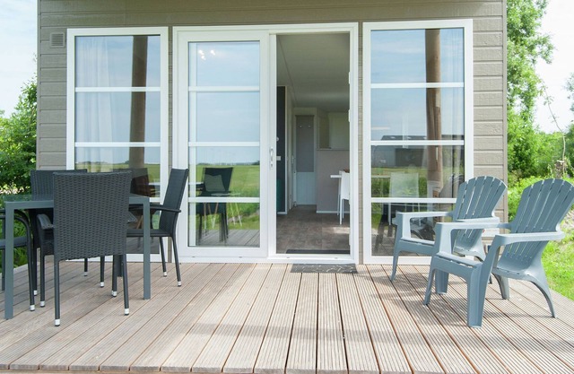Chalet with covered terrace, near North Sea