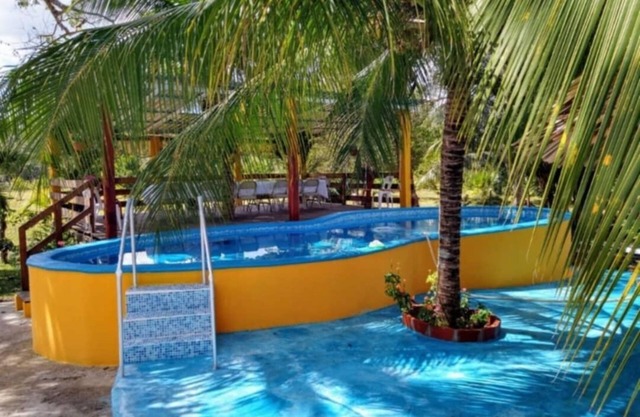 Charming 2-bedroom house with WiFi, AC, Pet Friendly,piscina in welcoming Xul-Ha