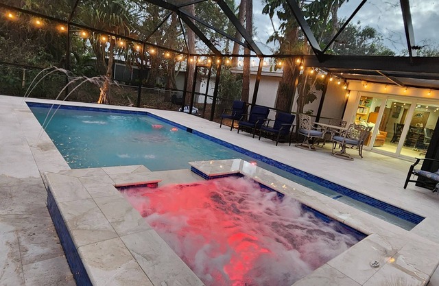 Charming 4-bedroom plus den villa with pool and spa near the beach and downtown.