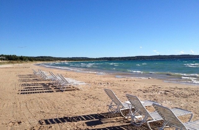 Charming Harbor Springs cottage right on the sandy beach and crystal water