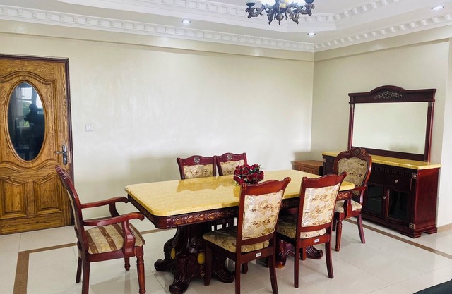 Chic 2-bedroom apartment with AC, WiFi in welcoming Dar es Salaam