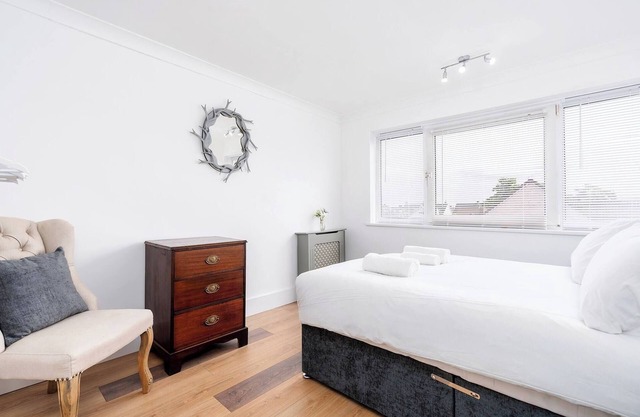 Chic 3BR Home with Balcony & Free Parking