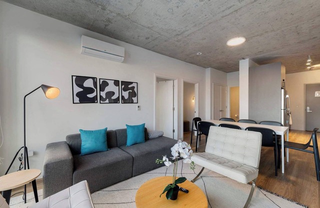 Chic 4-Bedroom with Skyline Views & Amenities