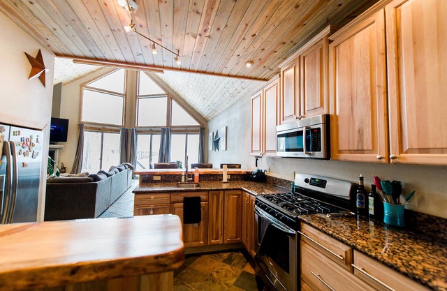 Close to Schweitzer, waterfront home w/private lake access, dock and patio