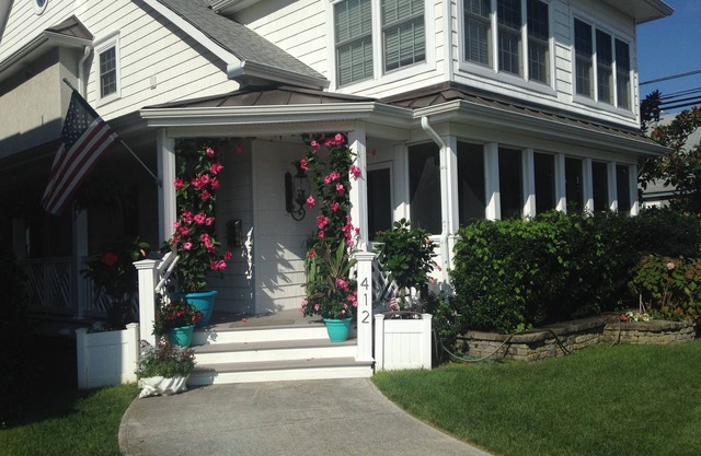 COASTAL ELEGANCE- PREMIER LOCATION - 5 HOUSES TO BEACH-RESIDENTIAL NEIGHBORHOOD
