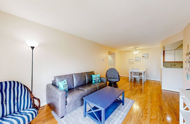 Coastal get away with pools, deck & central AC - close to shops & dining