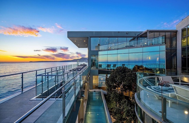 Coastal Masterpiece with Expansive Beachfront & Luxury Amenities