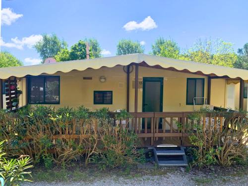 Comfortabele familie chalets met veranda incl airco dichtbij zee!