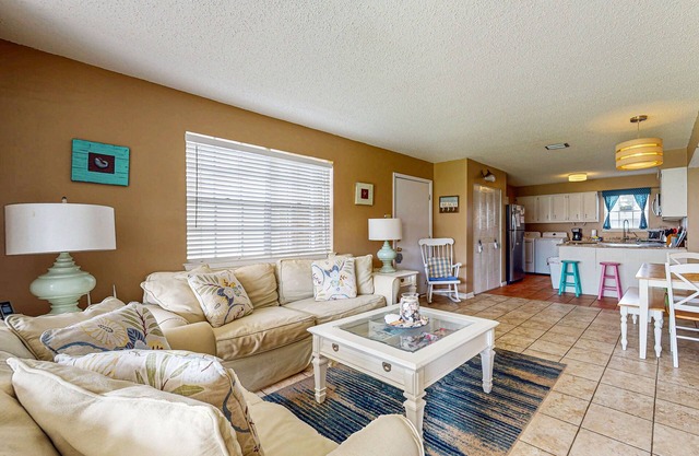 Condo with WiFi, boardwalk to beach, Gulf view, pool, & picnic area