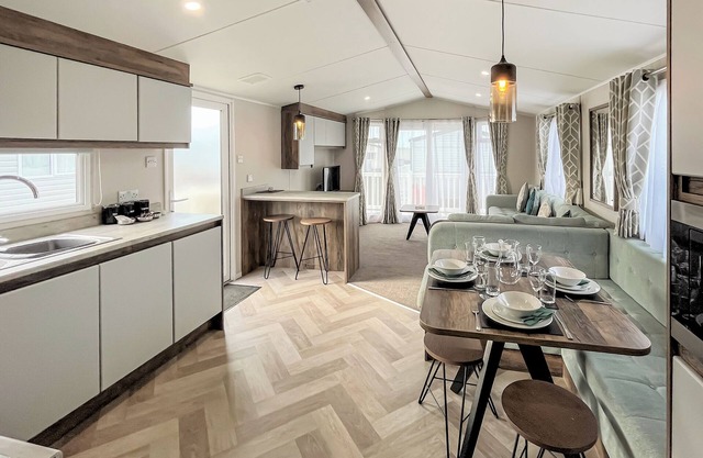 Contemporary caravan with one double and one twin.