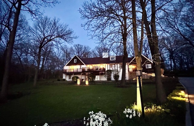 Contemporary Classic Mansion on .8 acred Wooded Estate with Private Lake.