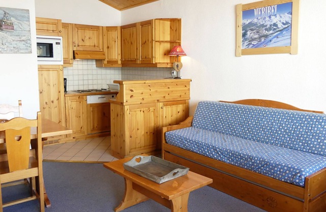 Cozy Apartment with South-Facing Terrace, Ski-In/Ski-Out Access