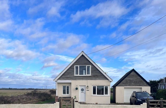 Cozy comfortable cottage by the sea and water, surrounded by fields and space