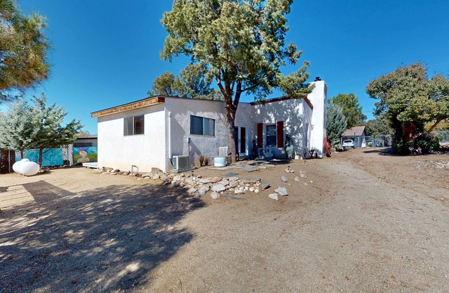 Cozy home with picturesque views of the mountains, a fireplace, and internet