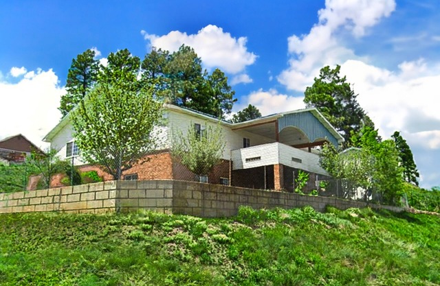 Cozy retreat with pool table, wet bar, treadmill, board games, and W/D access
