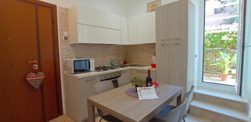 Dalia home - Giardino privato e metro C a 2 passi