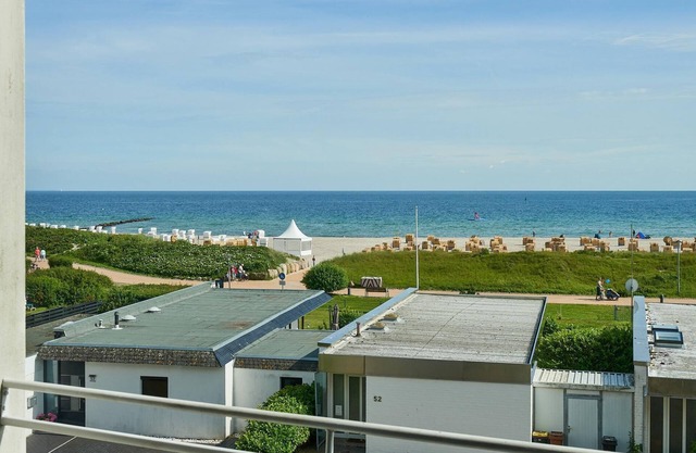 Vacation apartment Ostseezauber with balcony in the house Stranddistel 7 on Fehmarn