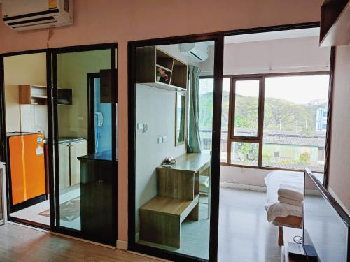 Deluxe Room at Tree Boutique Condo by Suwan Style Agency