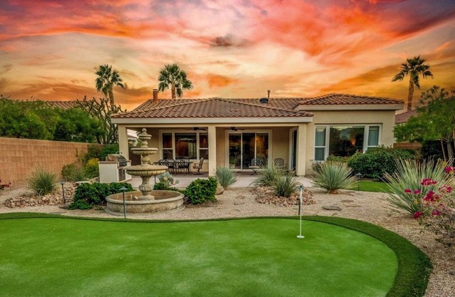 Desirable 2BR, 2BA house with breathtaking views, putting green, and golf cart!n